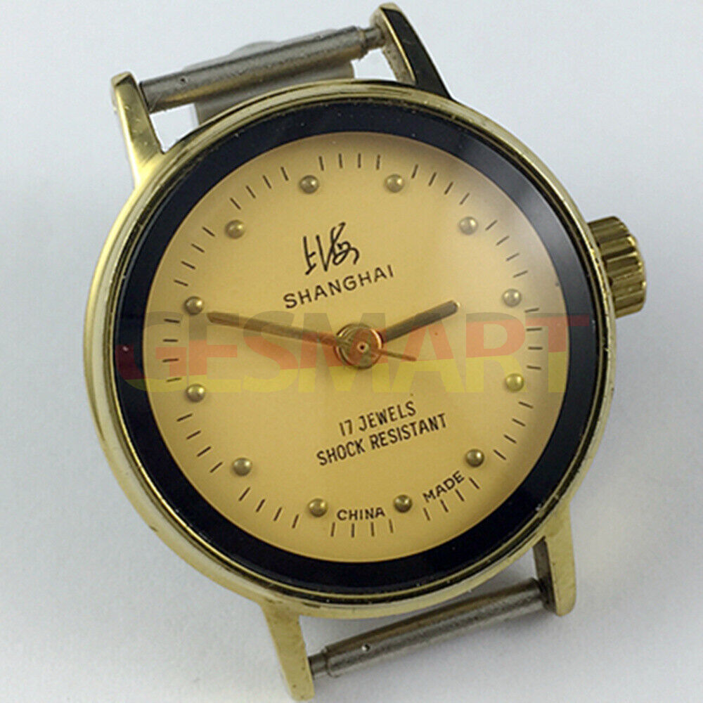 25mm China Made Lady manual mechanical watch with 17 jewels, yellow dial, and golden nail hands.