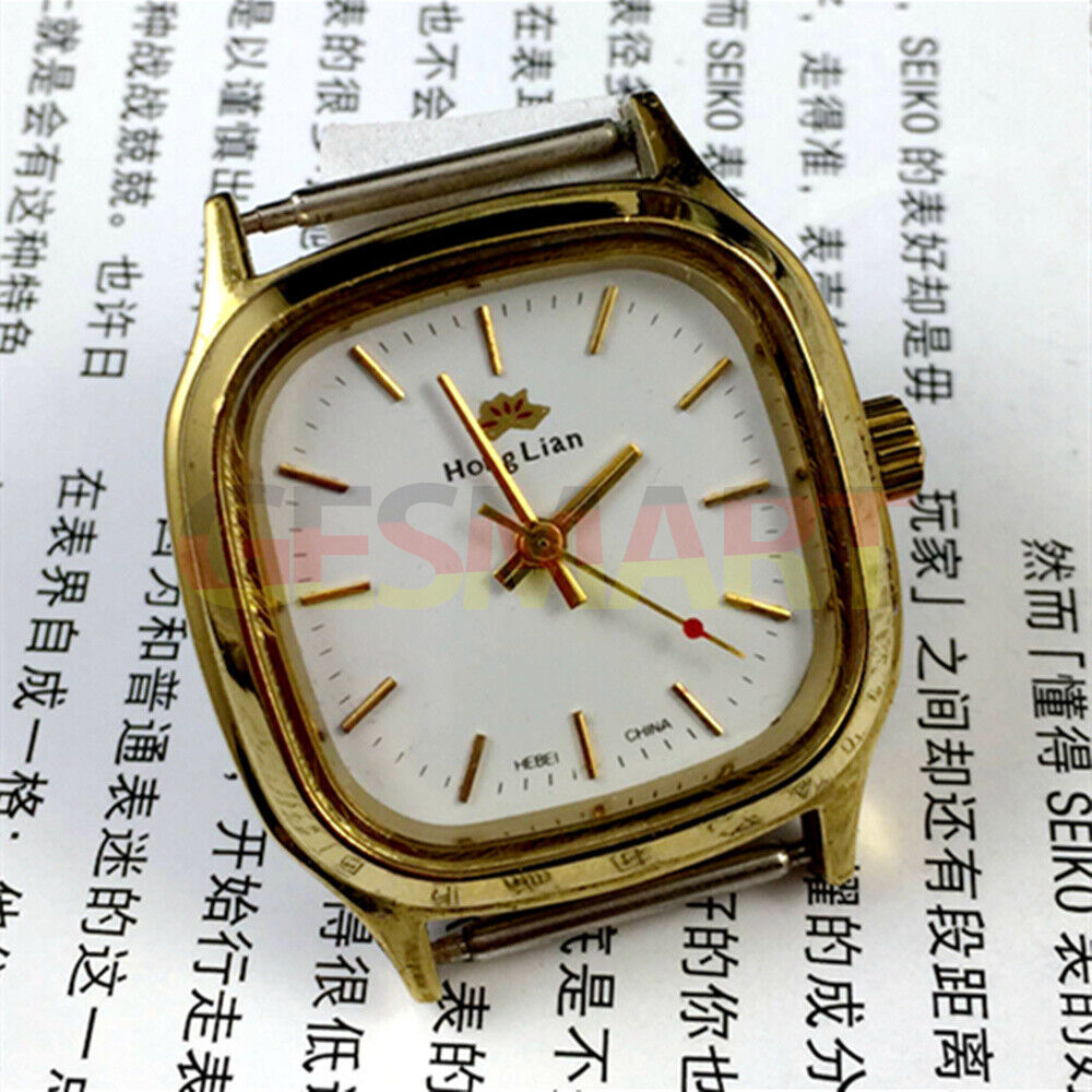 HONGLIAN manual mechanical watch with golden nail accents, square golden case, and white dial for elegant style.