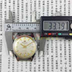 HONGLIAN 32mm manual mechanical watch with 17 jewels, golden nail markers, and sleek grey dial for classic style.