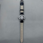 37mm China manual mechanical watch with black strap, silver dial, 19 jewels, shock-resistant design.