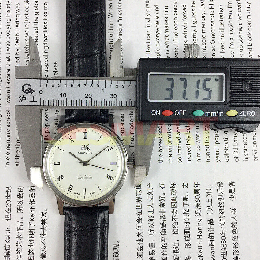 36mm Shanghai Factory 8120 manual watch with shock-resistant design and 17 jewels for durable performance.