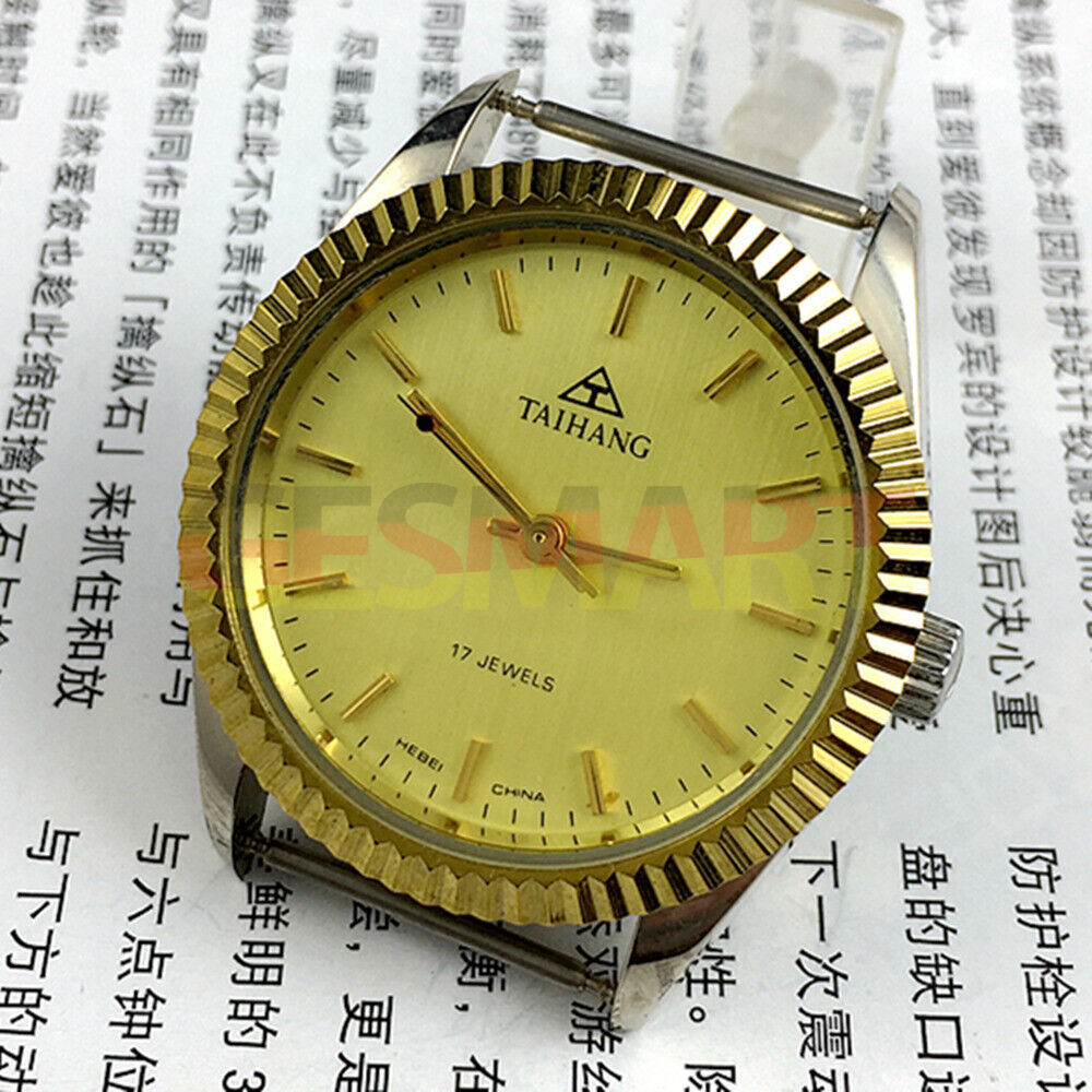 TAIHANG 38mm manual mechanical watch with golden dial, round case, and nail markers, 17 jewels.