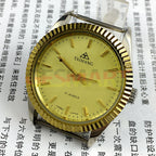 TAIHANG 38mm manual mechanical watch with golden dial, round case, and nail markers, 17 jewels.