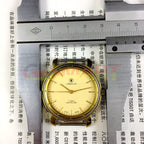 Shanghai Jinji 37mm manual watch with 17 jewels, shock-resistant, gold-tone nail accents and classic design.