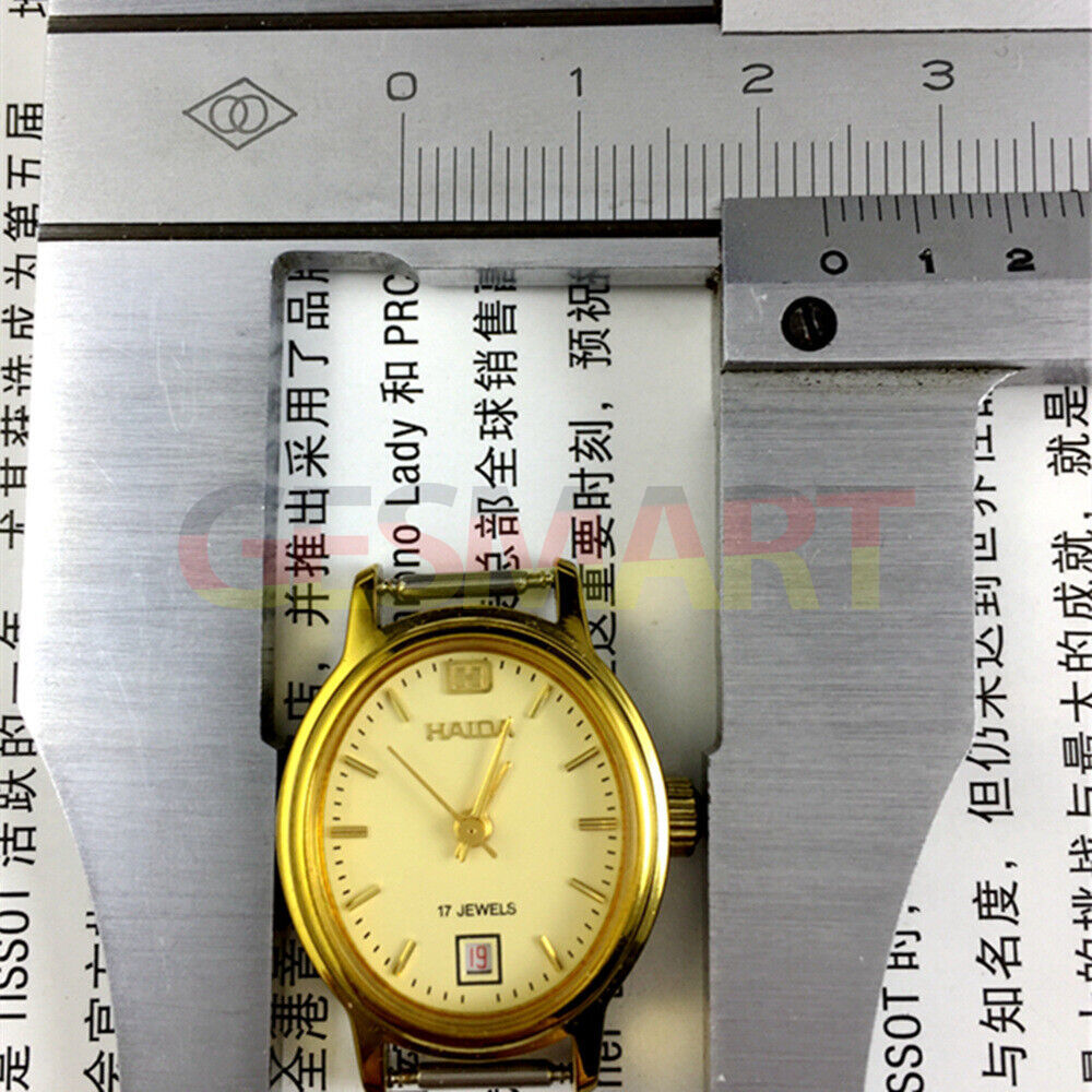 1. 23mm lady watch with golden oval nail case, 17-jewel manual movement, single calendar @6  
