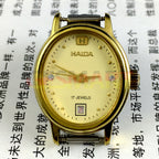 Elegant manual mechanical lady watch with imitation diamond markers, 17 jewels, single calendar at 6, classic style.