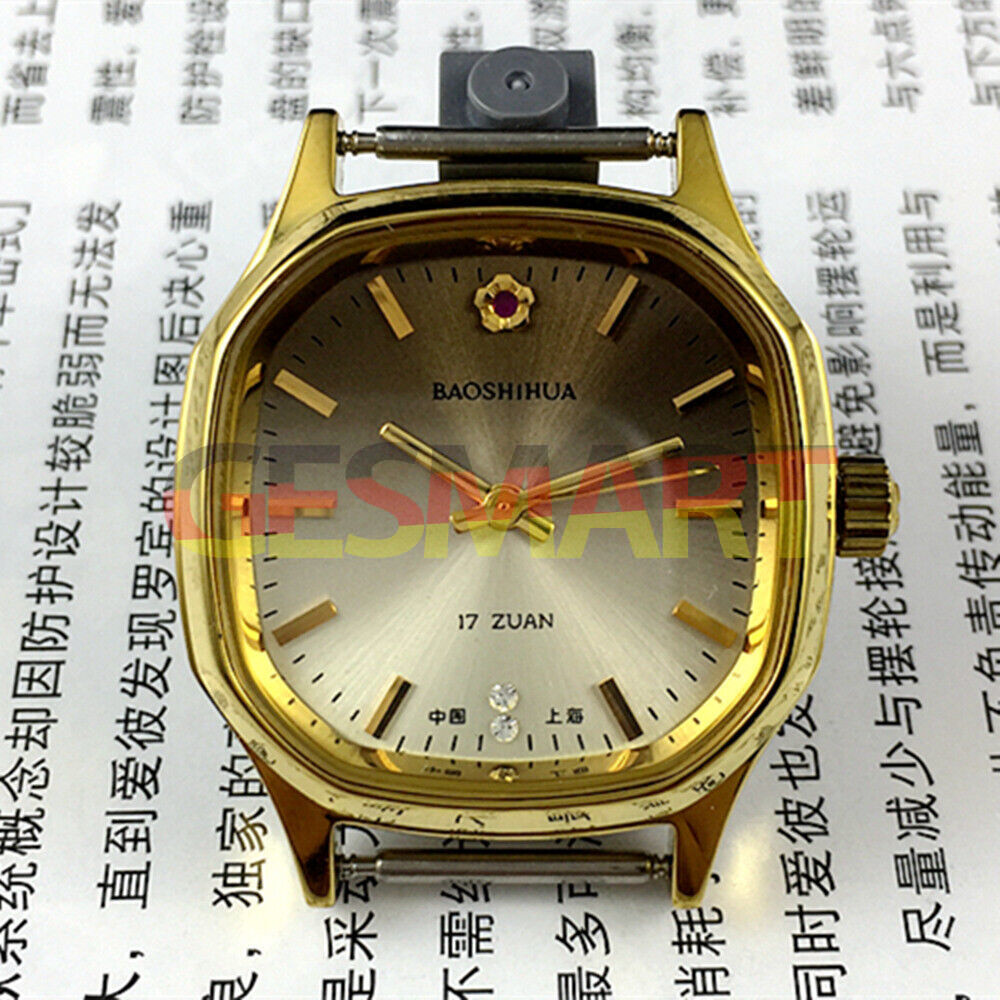 Shanghai Manual Mechanical Watch with golden indices, light brown dial, and elegant octagonal stainless steel case by Shanghai.