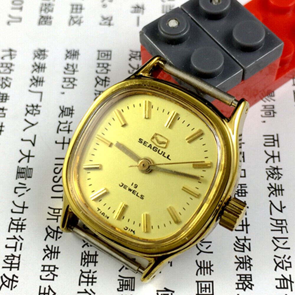 Golden dial ladies watch with 19 jewels, manual mechanical movement by Seagull, Tianjin China brand.