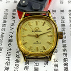 Golden dial ladies watch with 19 jewels, manual mechanical movement by Seagull, Tianjin China brand.