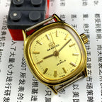 Seagull ladies watch with golden dial, 19 jewels, manual mechanical movement from Tianjin, China.
