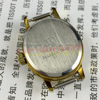 Elegant 23mm lady watch with golden oval case, 17-jewel manual movement, and single calendar at 6 o'clock.
