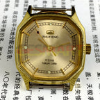 34mm Octagonal golden nail case mechanical watch by Tianjin Zhufeng, manual winding design.
