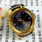 HAIDA 24mm manual mechanical lady watch with golden nail markers, 17 jewels, and grey dial round case.