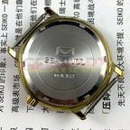 35mm golden case Tianjin Seagull watch with round dial, manual mechanical movement, classic design.