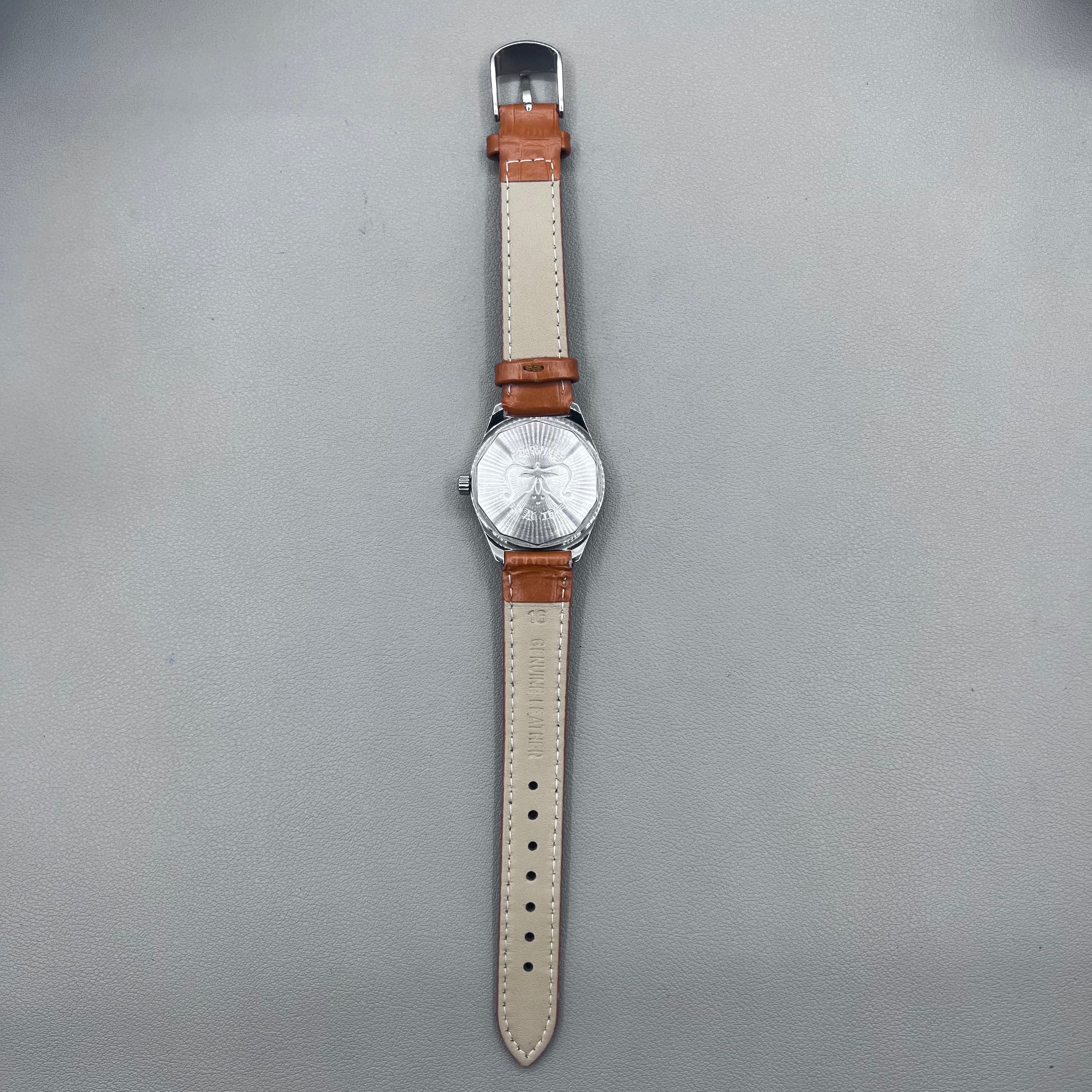 HONGLIAN 32mm brown leather band manual watch with 17 jewels and Roman numeral dial.