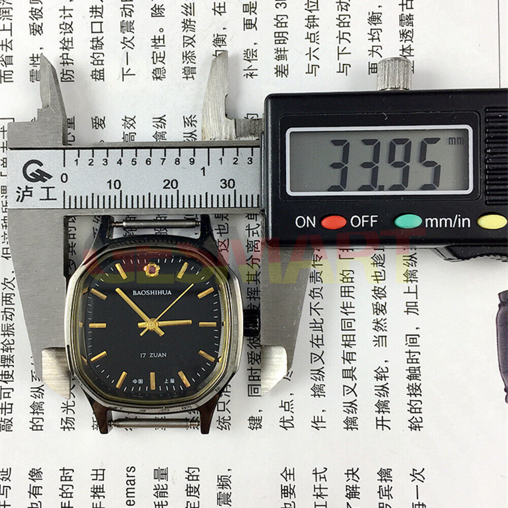 Shanghai Manual mechanical watch featuring golden hour markers, black dial, and octagonal case with 17 jewels in a classic design.