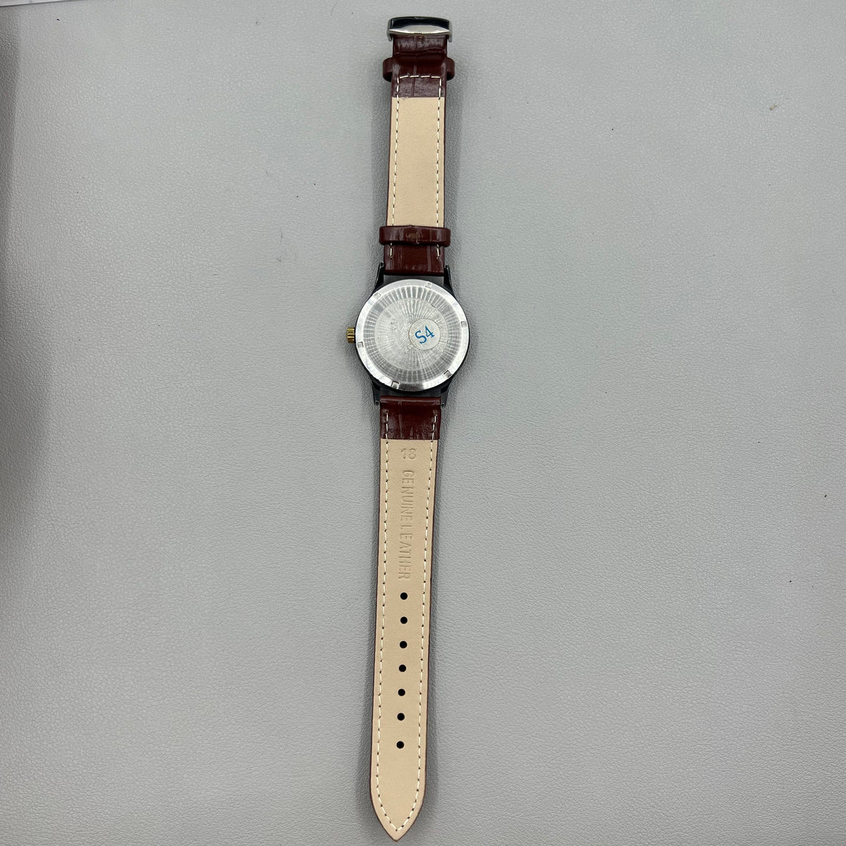 Shanghai 37mm manual mechanical watch with brown leather strap, Roman numerals, 17 jewels, classic style.