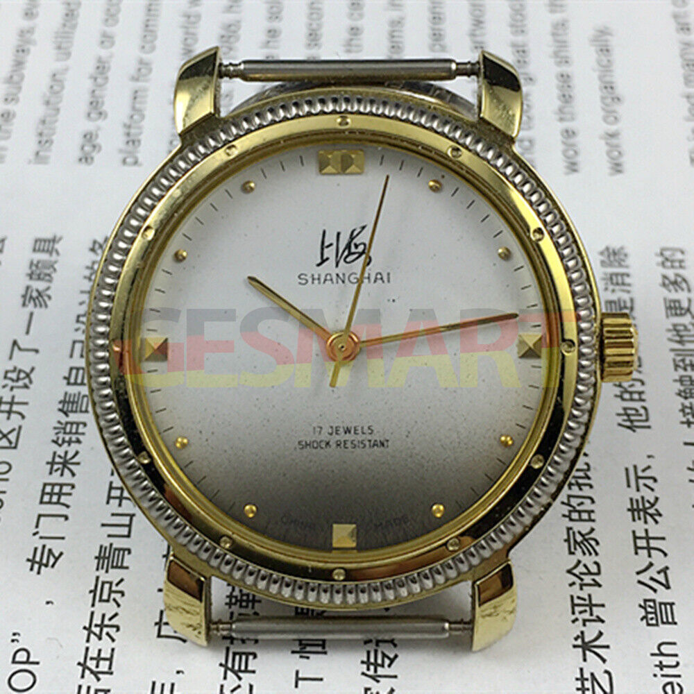 Shanghai Factory manual mechanical watch with golden nail markers and gradient grey dial for elegant style.