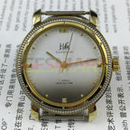 Shanghai Factory manual mechanical watch with golden nail markers and gradient grey dial for elegant style.