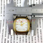 HONGLIAN manual mechanical watch with golden nail indices, square gold case, and white dial for elegant wear.