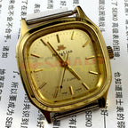HONGLIAN manual mechanical watch with golden nail markers, square golden case, and elegant golden dial for classic style.