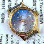 HAIDA 23mm ladies mechanical watch with golden markers, 17 jewels, and blue gradient dial for elegant wear.