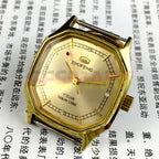 Tianjin Zhufeng 34mm octagonal golden nail case mechanical watch, manual winding with classic design.