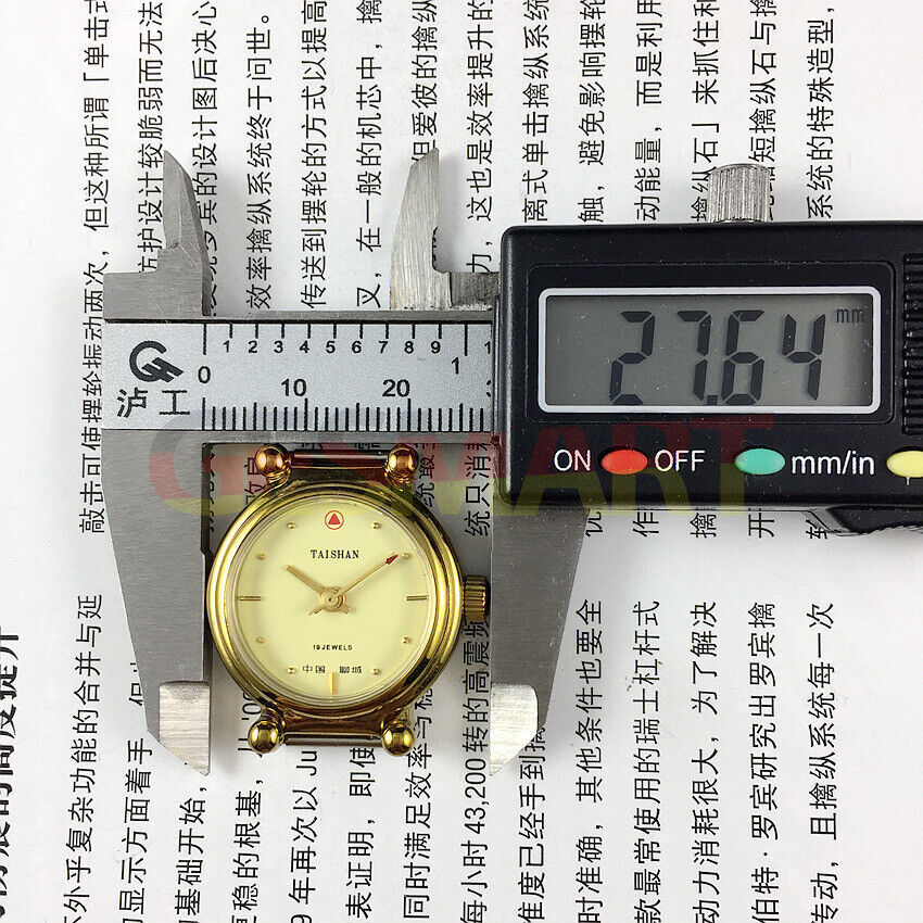 TAISHAN 27mm manual mechanical lady watch with golden case, yellow dial, and 19 jewels for elegant style.