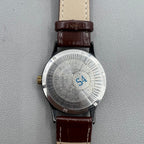 Shanghai 37mm manual mechanical watch with brown leather strap, Roman numerals, 17 jewels, classic style.