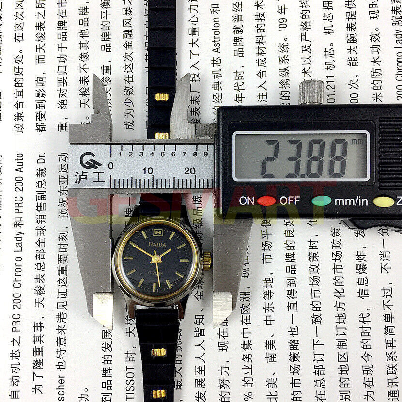 HAIDA elegant 23mm lady watch with black dial, golden nails, 17 jewels, and manual mechanical movement.
