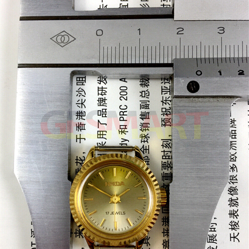 Shanghai Haida 24mm lady watch with golden nail markers, 17 jewels, and manual mechanical movement.