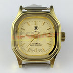 Elegant 26mm SHANGHAI JINJI lady watch with golden square case and 17 jewel manual mechanical movement.