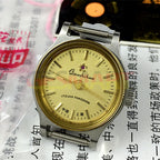 Shanghai Manual Mechanical Lady Watch with yellow dial, golden nails, round case, 17 jewels craftsmanship for elegant style.