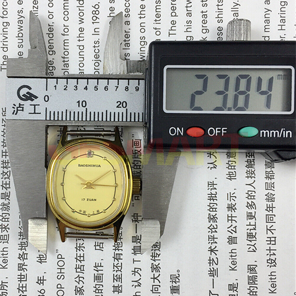 Shanghai Manual Mechanical Lady Watch with golden nails and yellow oval dial, featuring 17 jewels and elegant style.