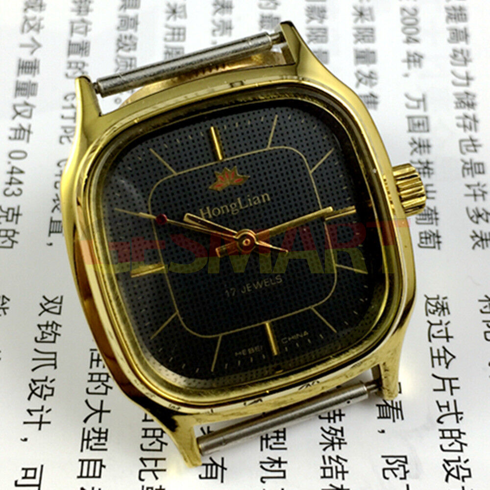 HONGLIAN 34mm manual mechanical watch with black dial and golden nail markers in a square golden case.