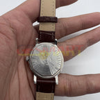 Shanghai 33mm manual mechanical watch with single calendar, 17 jewels, shock-resistant design.