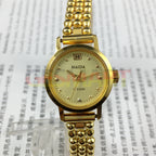 Shanghai brand lady manual mechanical watch with 17 jewels and golden nail design, 22mm case size.