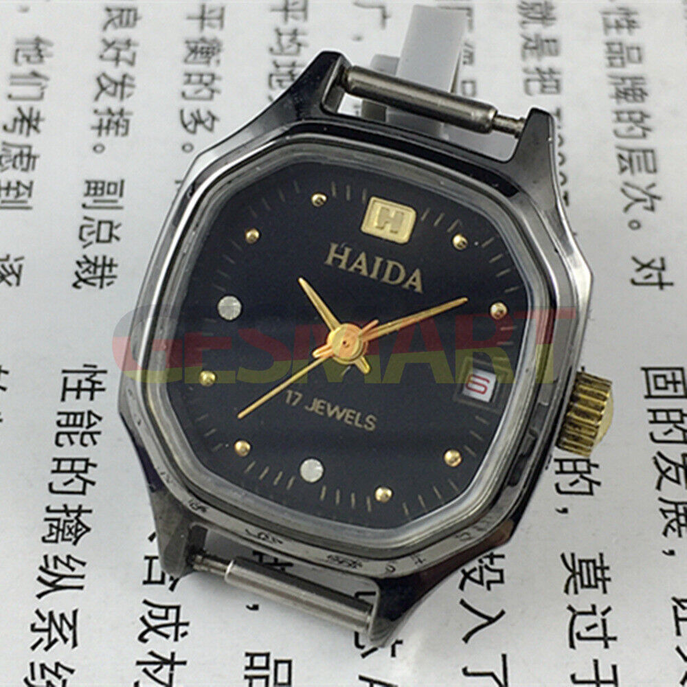 Manual mechanical lady watch with octagonal case, imitation diamonds, 17 jewels, elegant design.