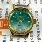 HAIDA 23mm mechanical lady watch with golden nail markers and gradient green dial, 17 jewels movement.