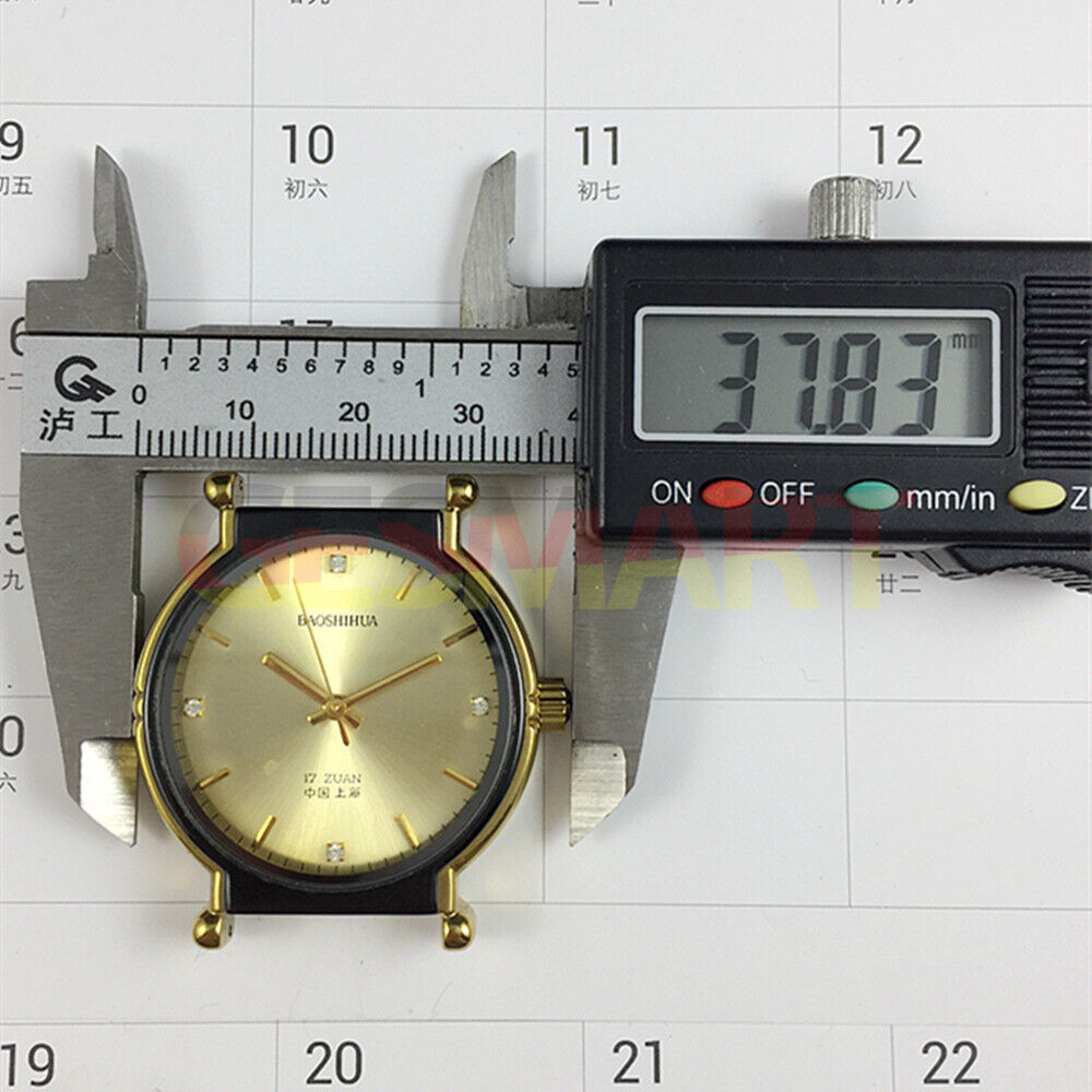 Shanghai 37mm manual mechanical watch with golden markers, black case, and golden dial for classic elegance.