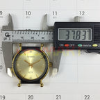 Shanghai 37mm manual mechanical watch with golden markers, black case, and golden dial for classic elegance.