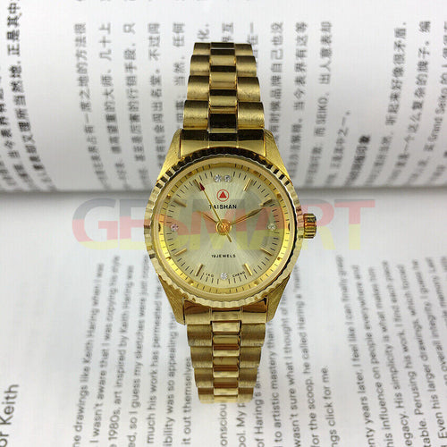 Elegant 27mm TAISHAN manual mechanical lady watch with imitation diamond markers, perfect for stylish wear.