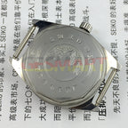 Chinese Taihang 32mm manual mechanical watch with 17 jewels, black dial, and gold nail markers for classic elegance.
