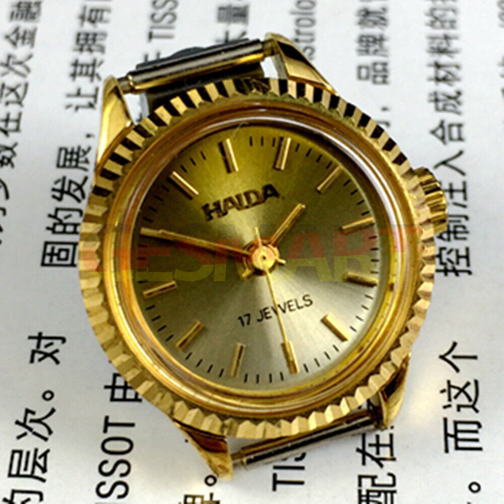 Elegant 24mm Shanghai Haida lady watch with golden nail markers, 17 jewels, and manual mechanical movement.