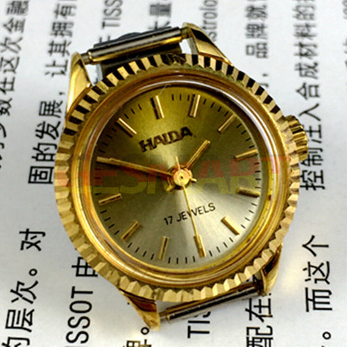 Elegant 24mm Shanghai Haida lady watch with golden nail markers, 17 jewels, and manual mechanical movement.