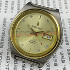38mm China Made automatic watch with 17 jewels, double calendar, and golden dial.