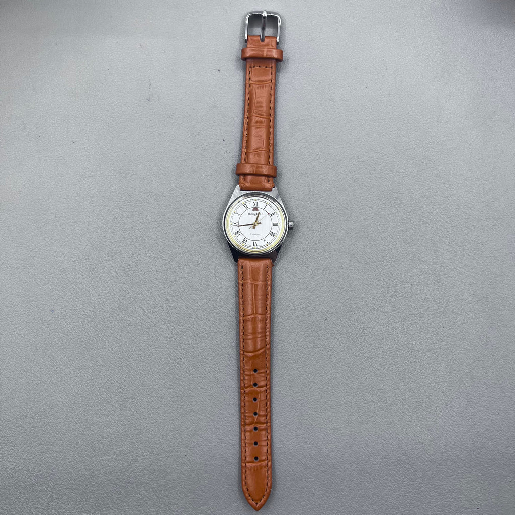 HONGLIAN 32mm brown leather band manual watch with 17 jewels and Roman numeral dial.