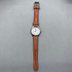 HONGLIAN 32mm brown leather band manual watch with 17 jewels and Roman numeral dial.