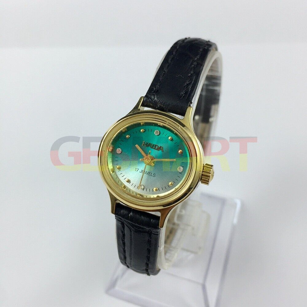 HAIDA Lady watch with golden nail markers, 17 jewels, gradient green oval dial, elegant accessory.