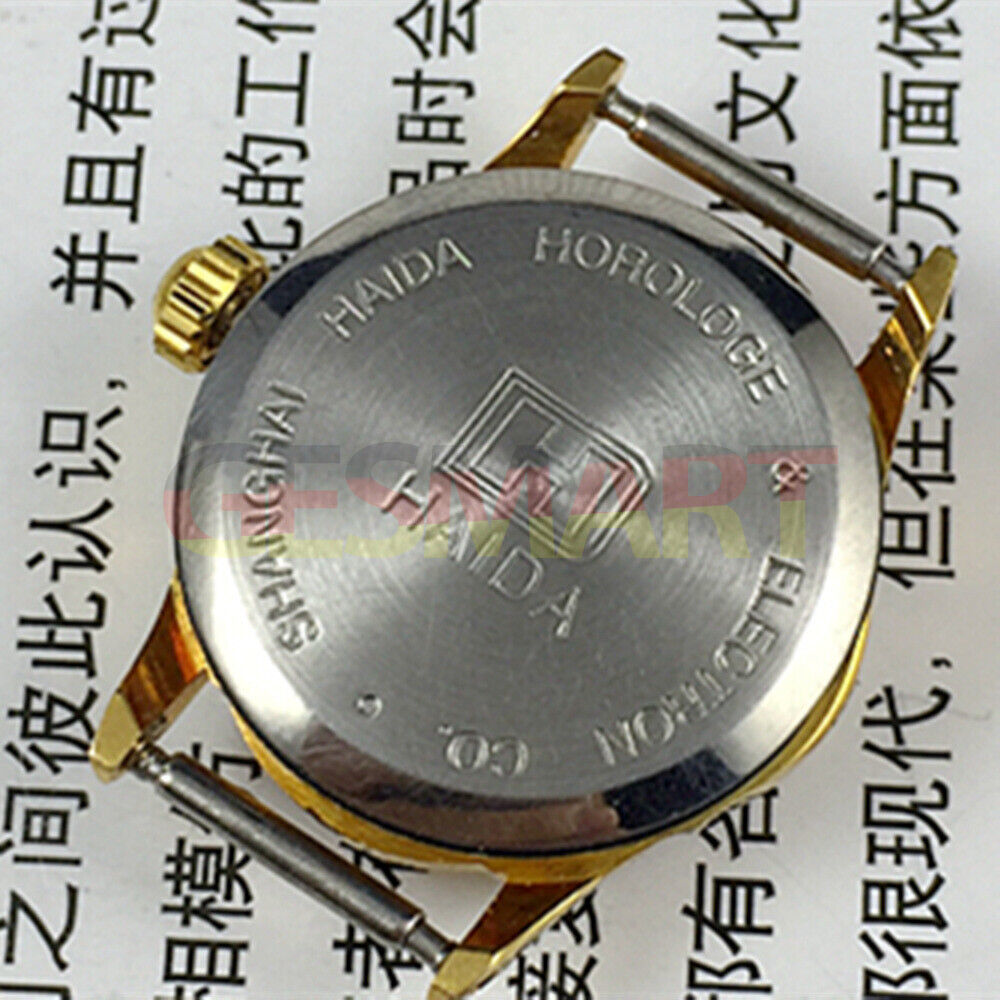 Classic 21mm Shanghai Made Lady watch with white dial, golden nails, manual mechanical movement, 17 jewels.
